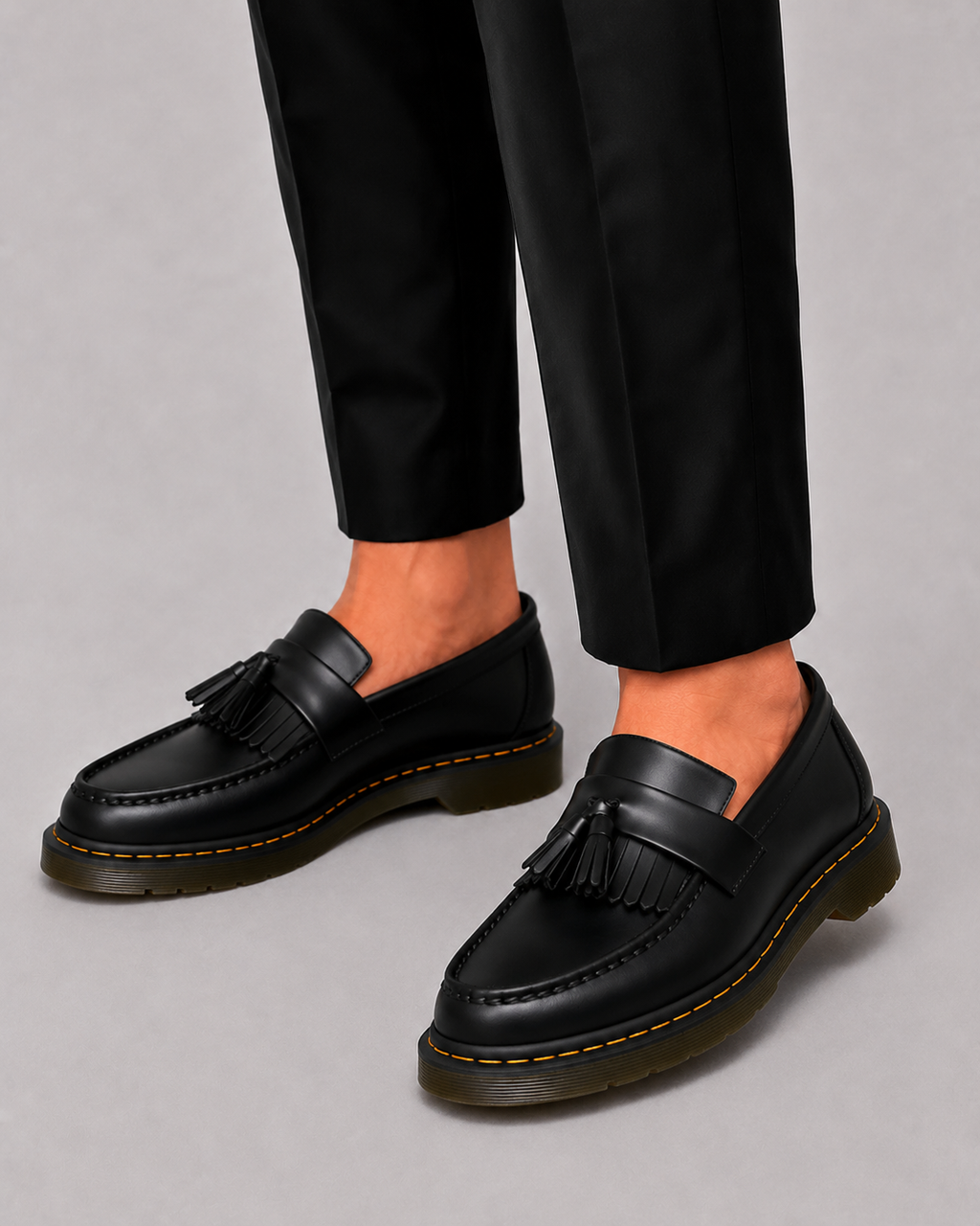 MOCASSINS EN CUIR À POMPONS POUR HOMME